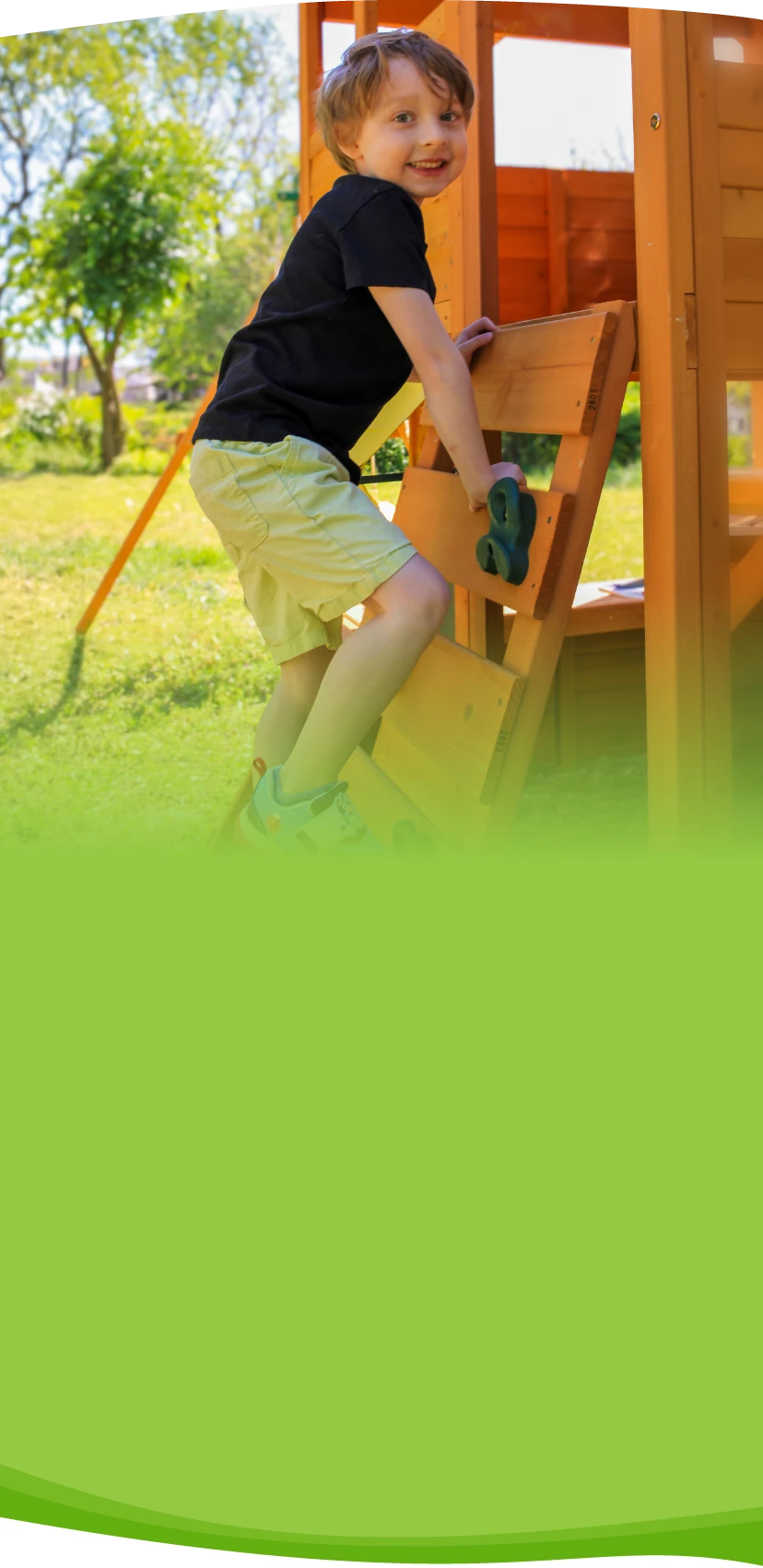 Nathaniel climbing a play structure